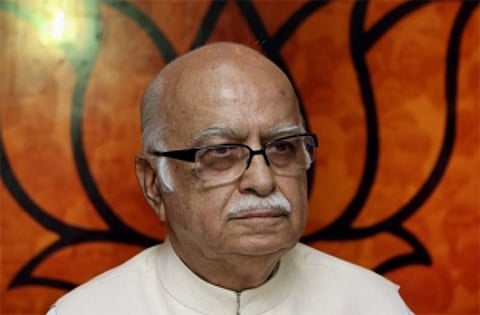 Advani quits all party posts