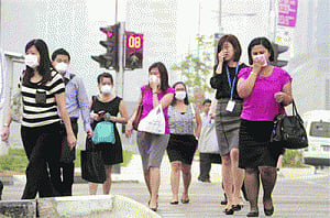 Thick haze sweeps through Singapore