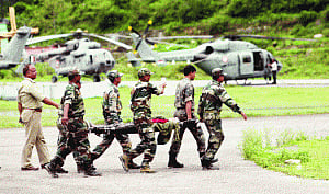 Forces brave landslides, rain to rescue countrymen