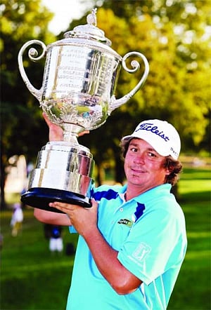 Emotion-less Dufner wins 1st major title