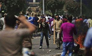 Death toll in Egypt climbs to 421, Brotherhood defiant
