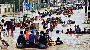Philippine capital shuts down amid floods