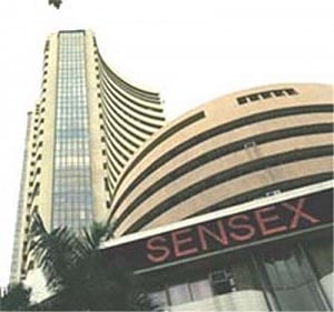 Sensex trades flat during pre-noon session