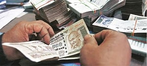 Rupee breaches 65-mark vs USD; down 104 paise in early trade