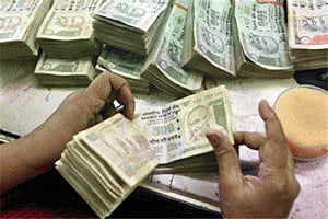 Rupee trims initial losses vs dollar, still down 32 paise