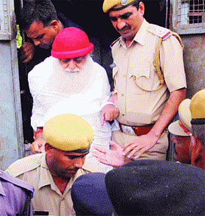 Cops coax clues, Asaram sent to jail for 14 days