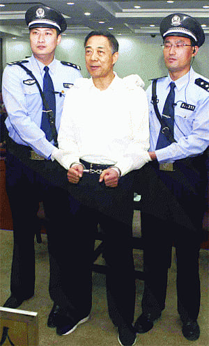 Defiant Bo smiles as court gives him life