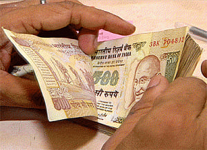 Rupee falls 23 paise vs dollar in early trade