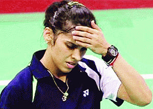 Defending champ Saina bows out