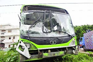 Woman crushed by DTC bus, driver held