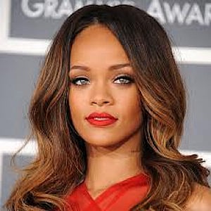 Rihanna poses naked with snakes for magazine cover