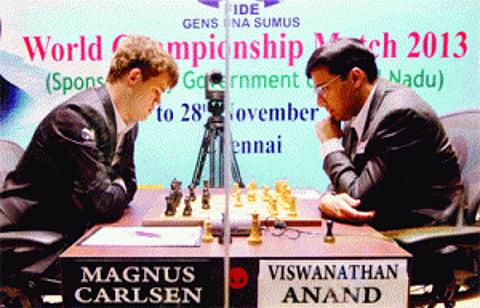 Anand holds off Carlsen