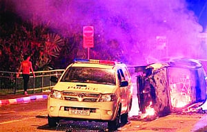 Eight more held, 24 Indians charged for rioting in Singapore