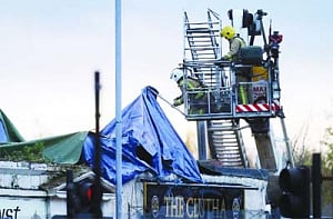 Copter crashes into Scottish pub, 8 dead