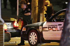 One Boston bombing suspect dead, hunt for another 'armed' man