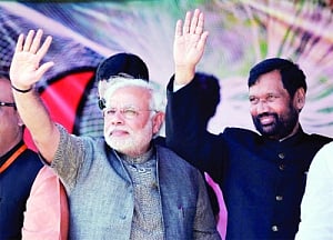 'NDA's focus progress, Cong's Modi'