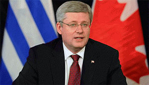 Canada warns Russia, says G8 membership at risk