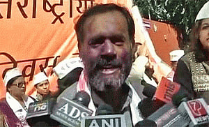 Yogendra Yadav's face inked