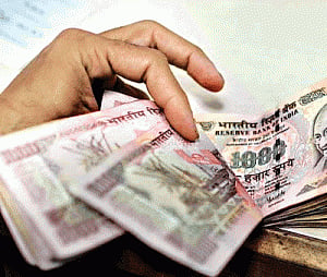 Rupee up 20 paise against dollar in early trade