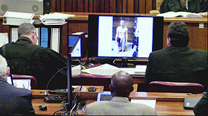 Police produces photographs of blood-stained prosthetic legs of Pistorius