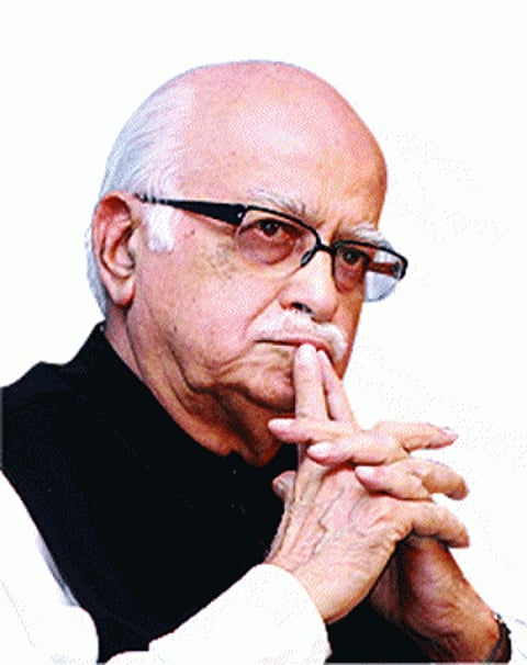 Advani relents after daylong firefighting