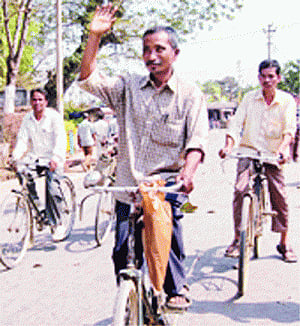 Riding cycle, ex-militant seeks votes in Assam