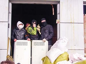 Four-way Ukraine talks announced as 'hostages' freed