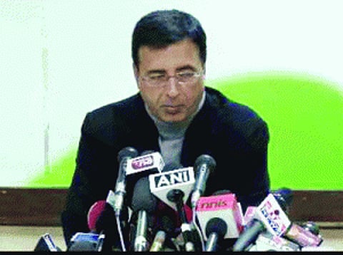 Cong throws the book at Modi, dubs him anti-Dalit