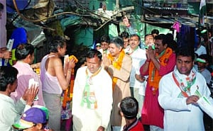 Sandeep Dikshit goes door to door for votes