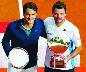 Federer gifts Monte Carlo trophy to Wawrinka