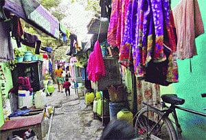 Rundown hovel amidst posh highrises slums it