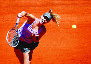 Nadal, Sharapova march on