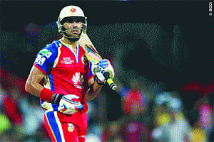 Yuvraj sings the willow song to Bangalore after rain
