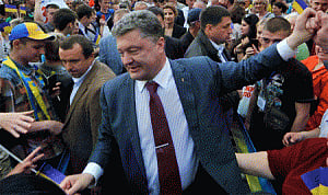 Ukraine's new leader to talk to Russia and east