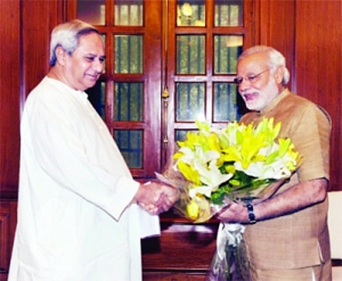 Naveen, Chandy meet Modi