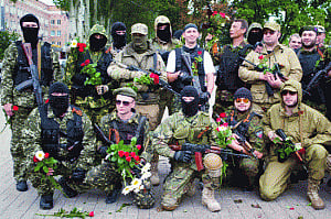 Ukraine reports new rebel attacks after ceasefire