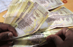 Rupee recovers 12 paise Vs dollar