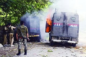 Cop cars torched in Tral after JeM militant's slaying