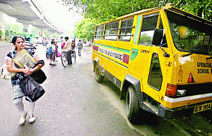 High-tension line falls on bus as utility pole uprooted