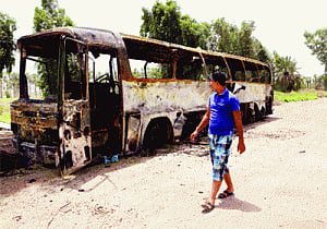At least 60 killed in attack on Iraq prison convoy