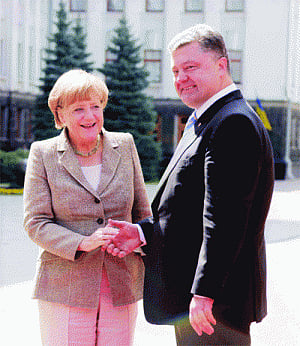 Merkel jets into Kiev as tensions soar over Ukraine