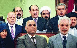 Al-Maliki steps down, backs rival for PM