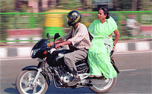 Helmets must for women pillion riders, save Sikhs