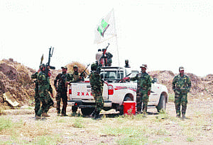 Iraqi forces break militant siege of Shia town