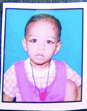 Child run over by reversing car