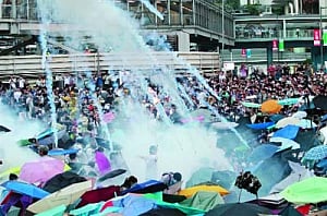HK police use tear gas to clear protesters