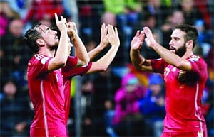 Spain back on track, England win again