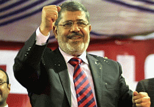 Egypt's Morsi asks people to continue revolution