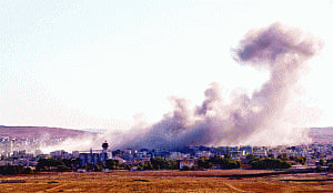 Syrian air raids kill at least 21 in ISIS-held town