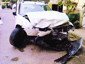 Rear-end collision forces Duster to crash into wall, BMW driver arrested